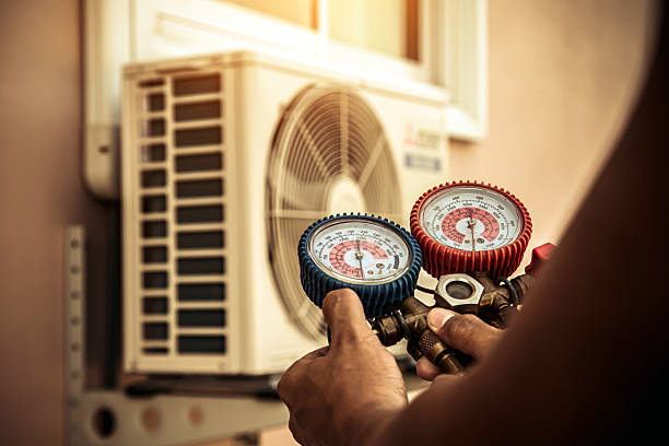 Professional Ac Installation technician working in Victoria, KS
